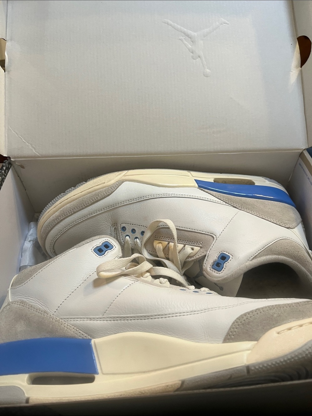 Jordan Men's White Leather Sneakers with Blue Accents